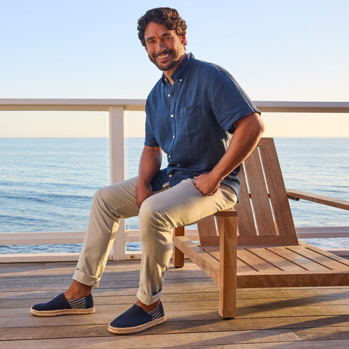 On model image of the men's navy stripe espadrille 