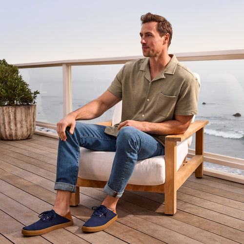 On model image of the navy Cordones lace up sneaker