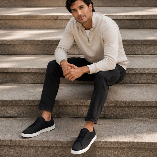 On model image of the black leather Miles lace up sneaker