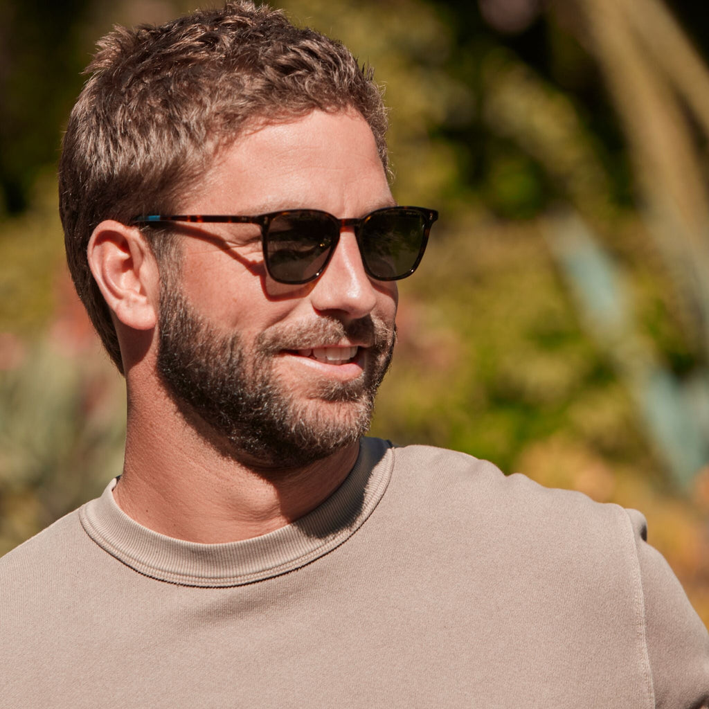 Unisex Emerson Handcrafted Sunglasses in Dark Tort frame with Bottle Green Polar Lenses model image