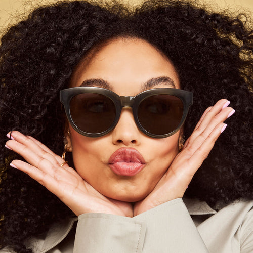 Women's Florentin Traveler Collection Sunglasses - model wearing Spruce frame with Crystal Green Grey Lens