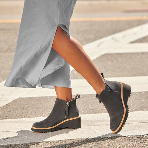 maude wedge boot in dark grey suede on model walking