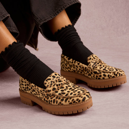 On model image of the Womens Cara Loafer Brown Sugar Leopard Print Hair Leather