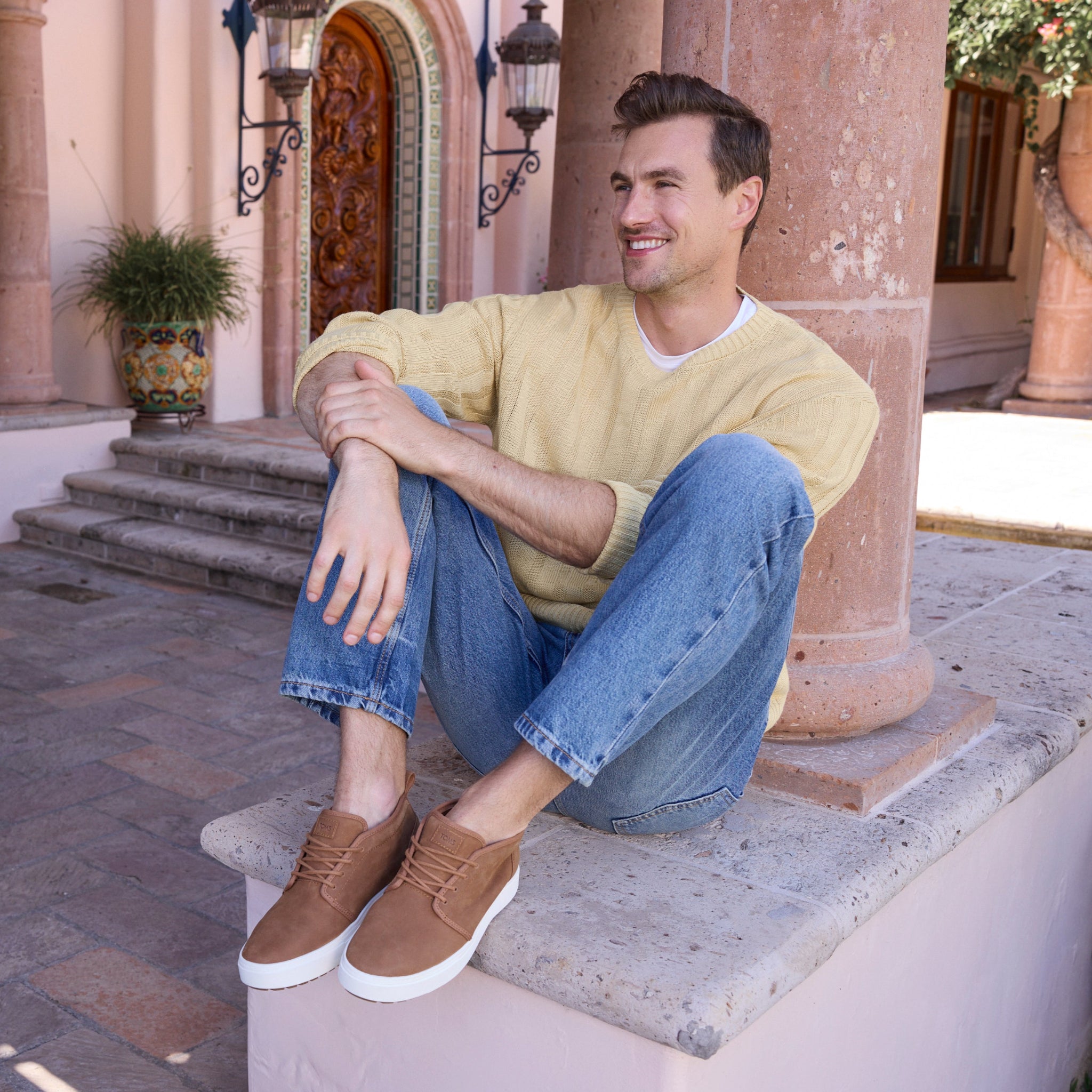 Carlo Mid Terrain 2.0 Sneaker in Water Resistant Tan Leather Lifestyle On Model Image