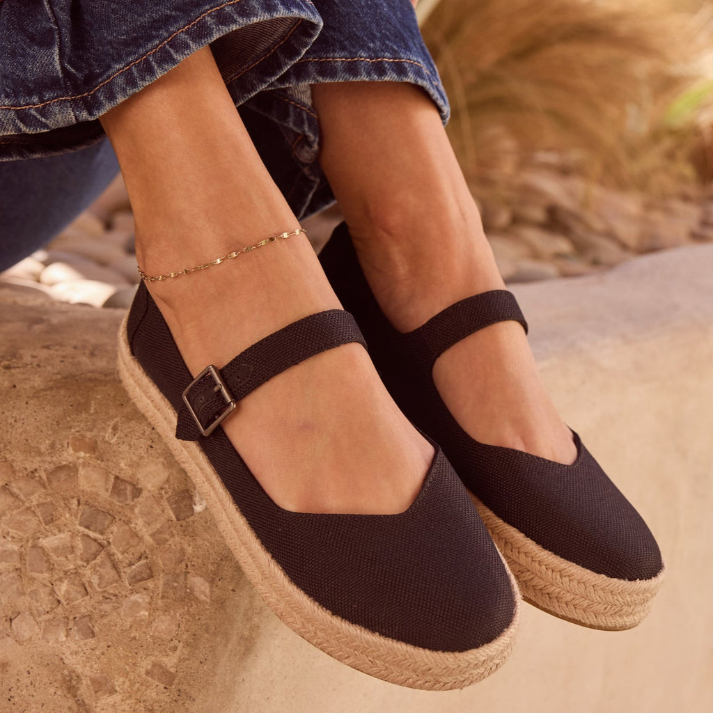 On figure image of the black Carolina Mary Jane espadrille