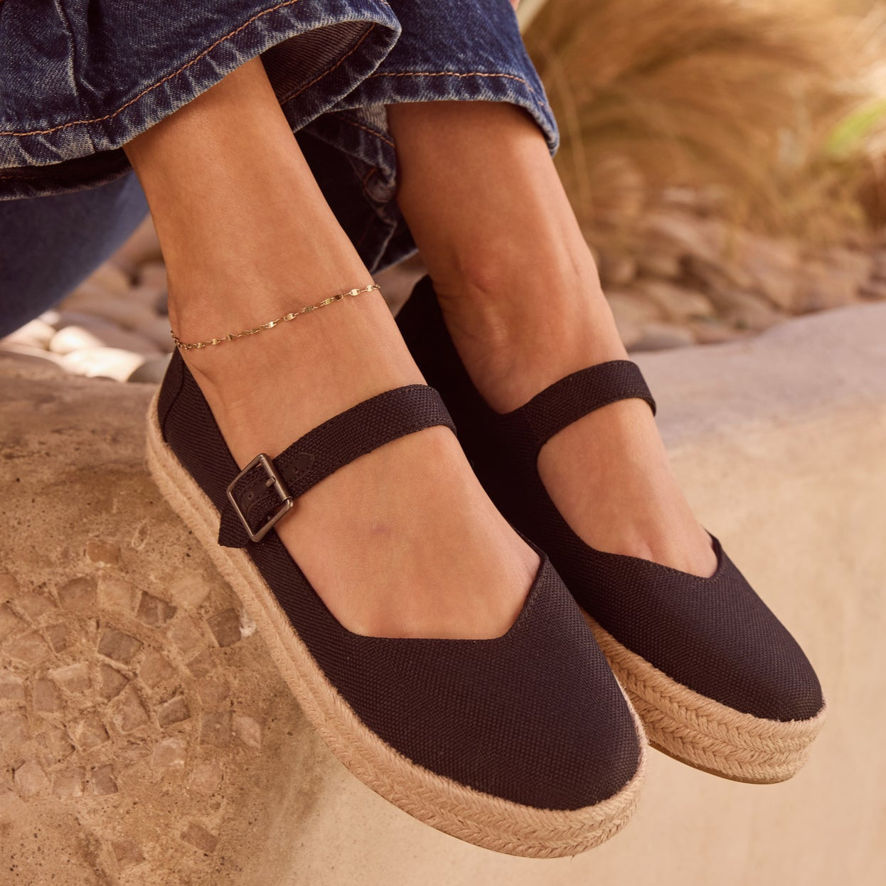 On figure image of the black Carolina Mary Jane espadrille