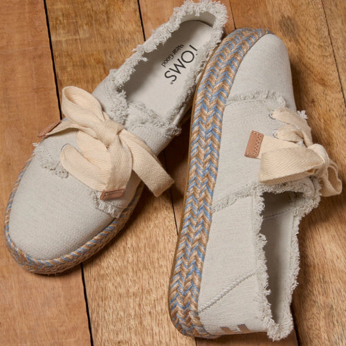 Laydown image of the white onyx textured denim fray lace up Carolina Espadrille