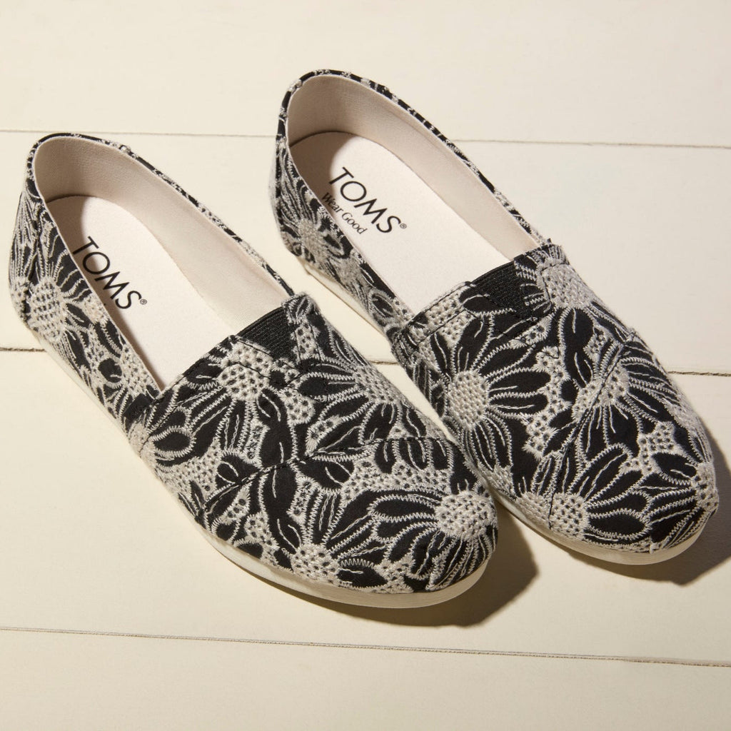 Laydown image of the Black Natural Oversized Floral Eyelet Alpargatas