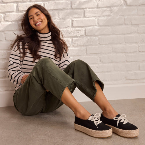 On model image of the black Valencia lace up espadrille