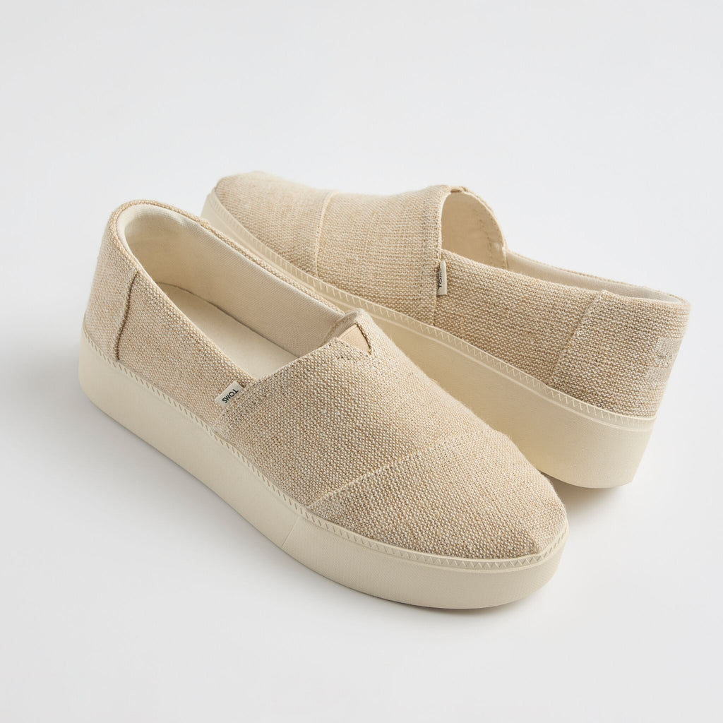 Laydown image of the natural heritage canvas Asher slip on sneaker