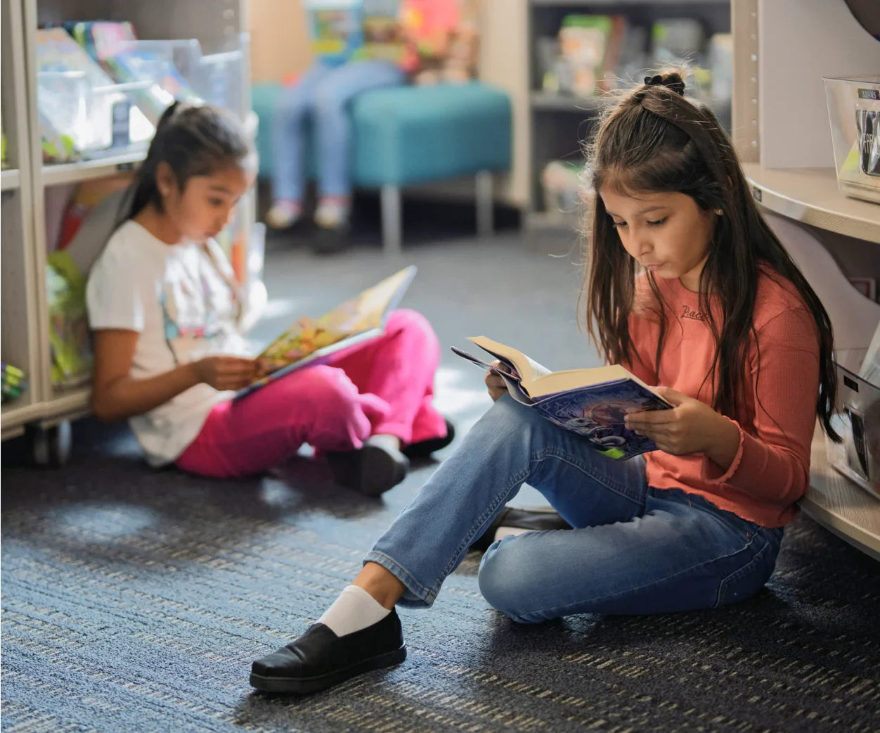 Children reading in a library.