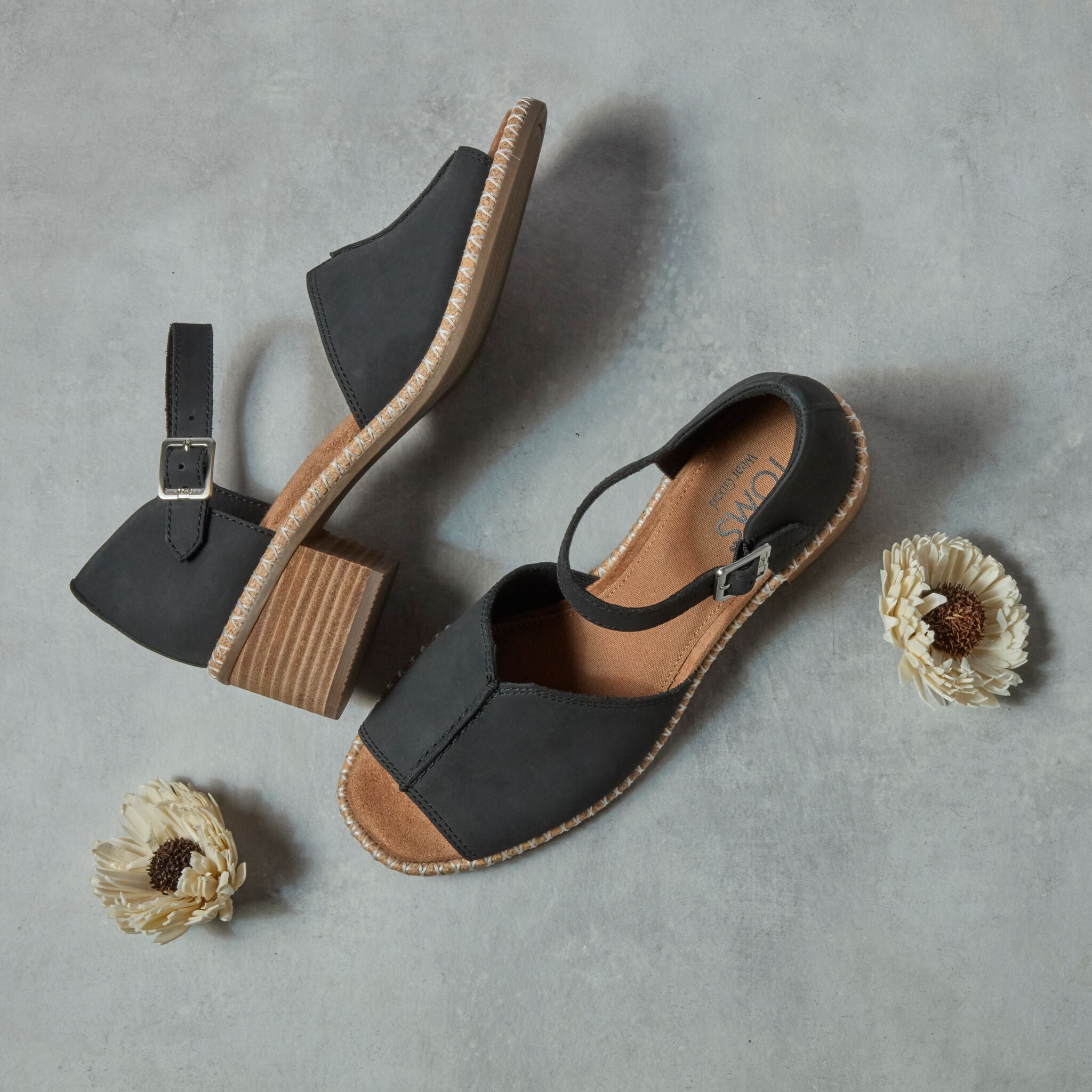 Laydown detail image of the black Ines heel