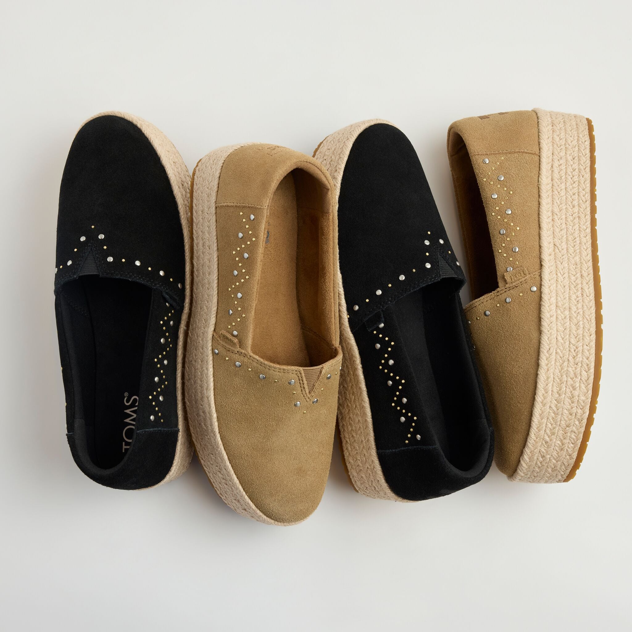 Laydown detail image of the black suede Valencia platform espadrille
