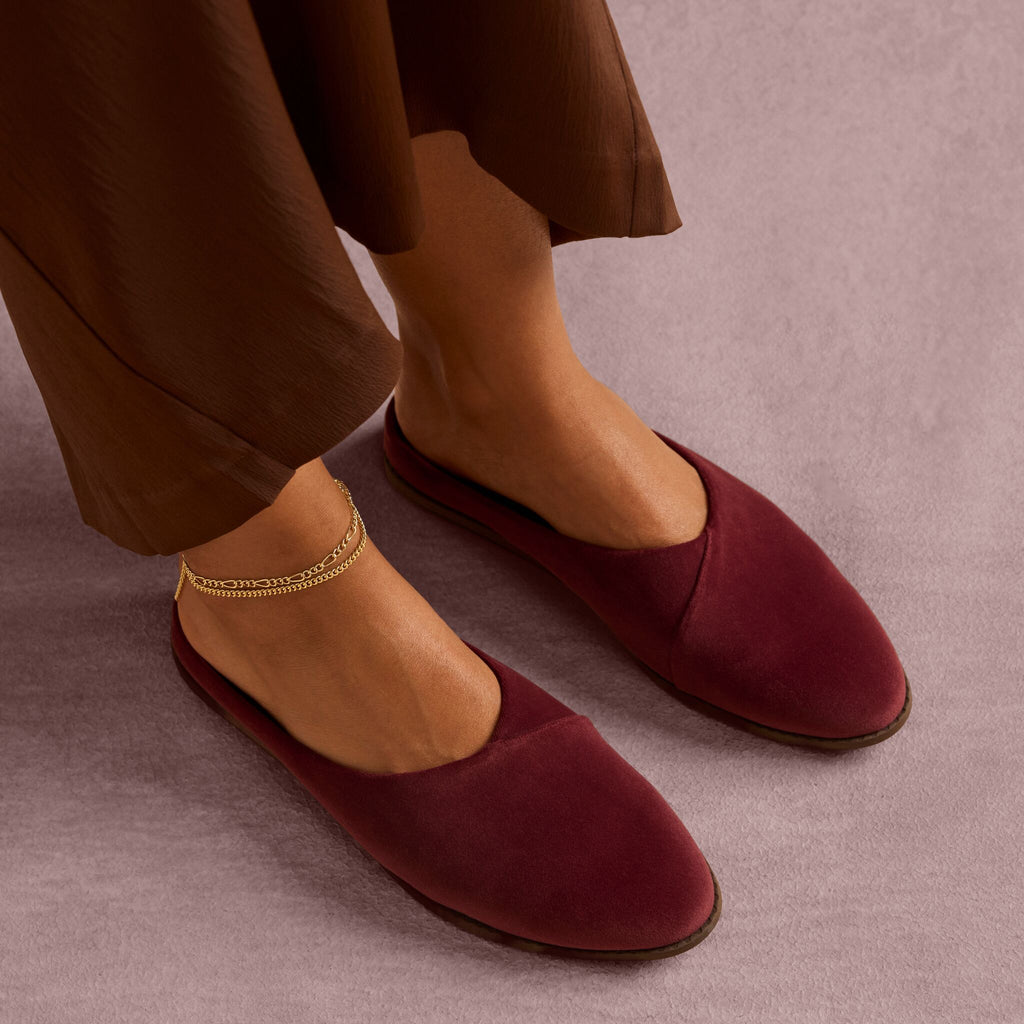 On model image of the Womens Amelia Mule Dark Burgundy Premium Velvet