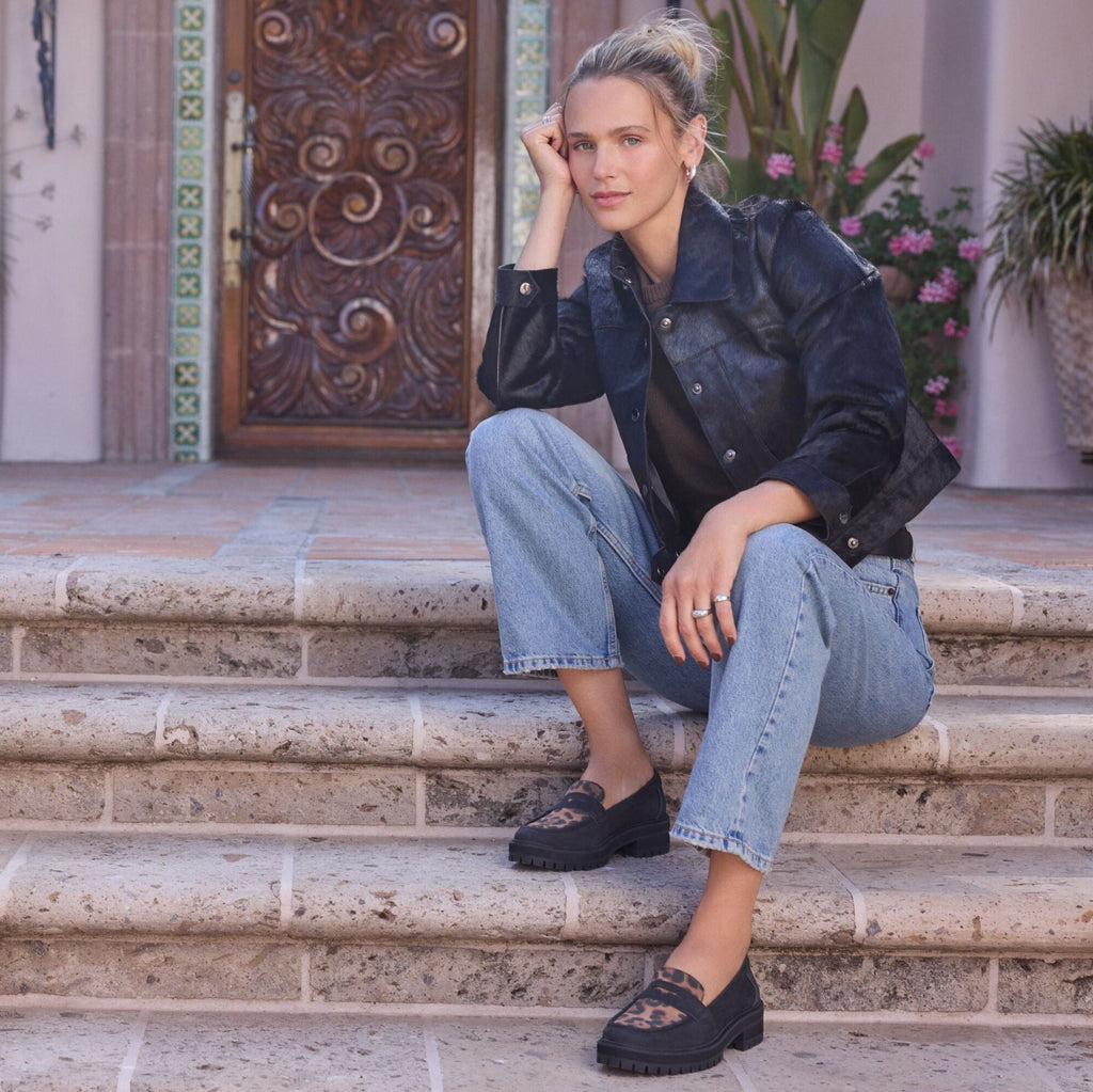 On figure lifestyle image of the Cara brown sugar leopard loafer