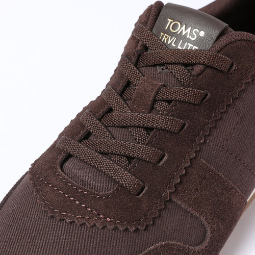 Laydown detail image of the the chocolate  brown TRVL Lite Palisade sneaker