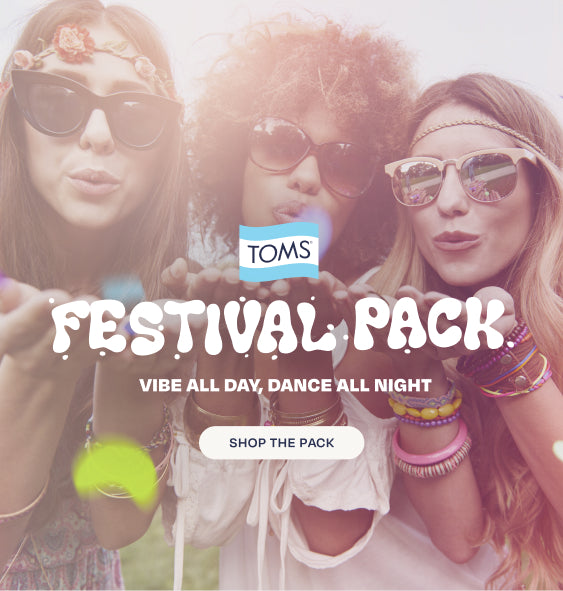 TOMS logo. FESTIVAL PACK. VIBE ALL DAY, DANCE ALL NIGHT. Shop the Pack. Festival scene background with 3 models.