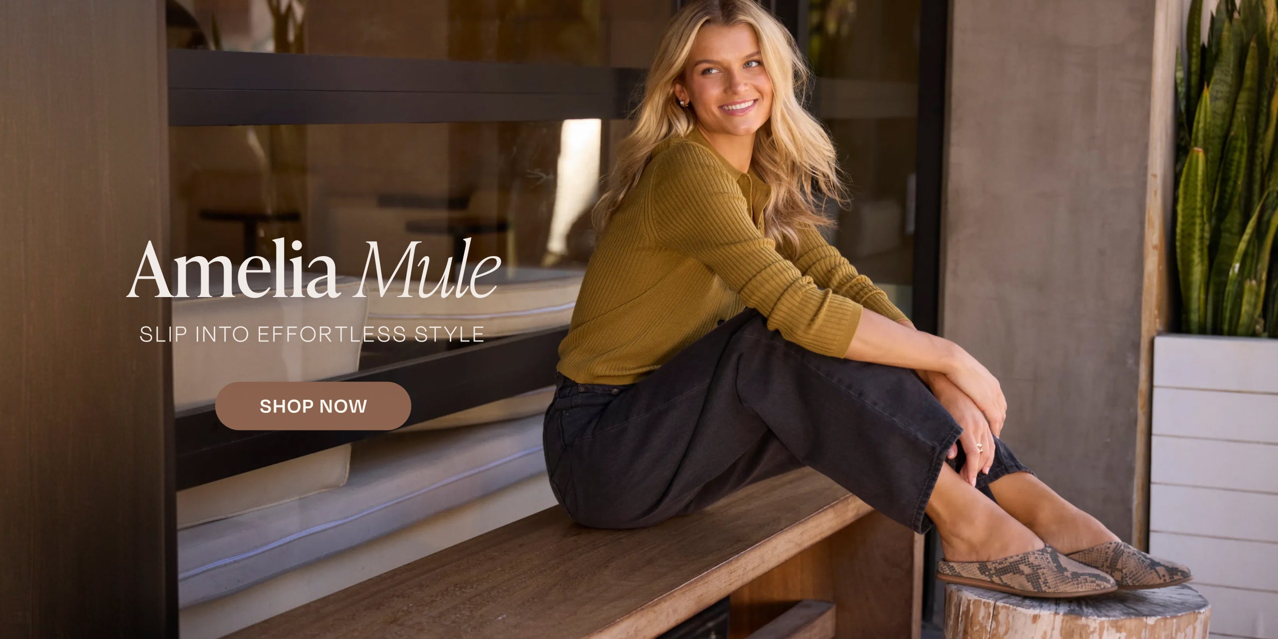 Amelia Mule. SLIP INTO EFFORTLESS STYLE. SHOP NOW: Taupe Snake Print Suede on model.