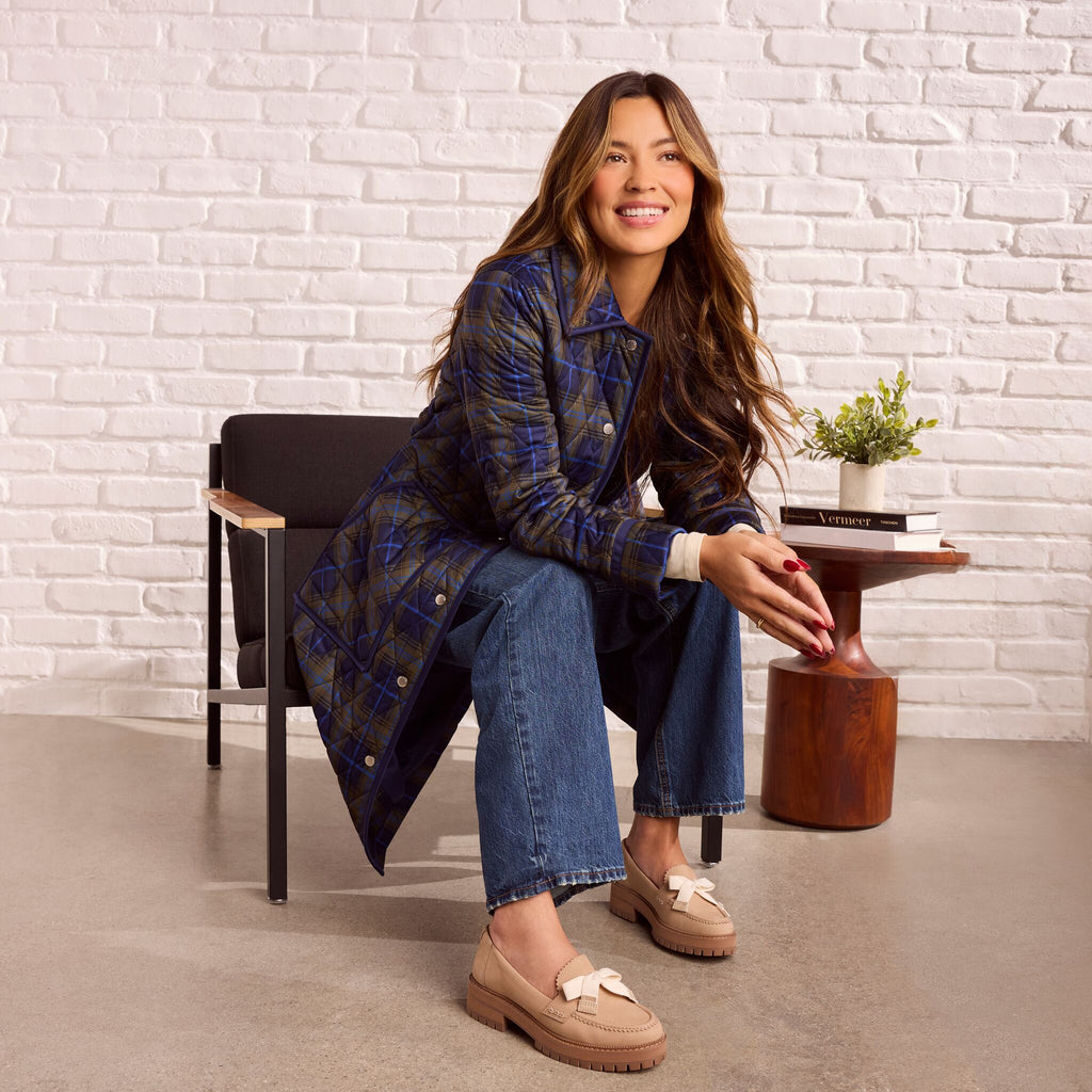 On model image of the taupe Cara bow loafer