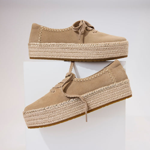 Laydown detail image of the taupe suede Valencia lace up espadrille